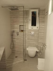 Koupelna v ubytování Giaglakis Rooms