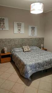 B&B Lido Azzurro tesisinde bir odada yatak veya yataklar
