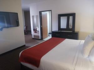 Postel nebo postele na pokoji v ubytování Hotel La Mina Parral