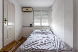 Postel nebo postele na pokoji v ubytování Spacious Loft with one bedroom and a big terrace