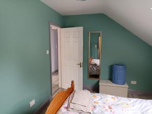 Postel nebo postele na pokoji v ubytování Foreen Lodge, Achill Island