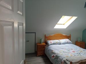 Postel nebo postele na pokoji v ubytování Foreen Lodge, Achill Island