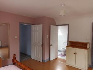 Postel nebo postele na pokoji v ubytování Foreen Lodge, Achill Island