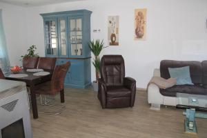 Posezení v ubytování Ferienwohnung am Gilsbach