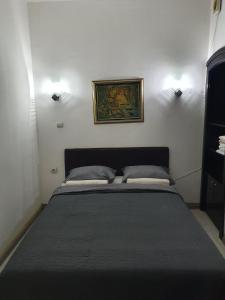 Postel nebo postele na pokoji v ubytování SB Apartman