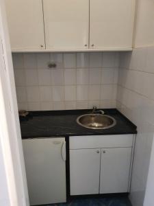 Kuchyň nebo kuchyňský kout v ubytování SB Apartman