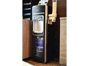 a refrigerator with a drink inside of it at Belken Hotel Kanda - Vacation STAY 80890v in Tokyo