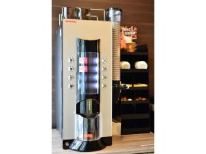 a coffee maker is sitting on a counter at Belken Hotel Kanda - Vacation STAY 80916v in Tokyo