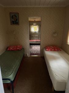 Ένα ή περισσότερα κρεβάτια σε δωμάτιο στο Berget