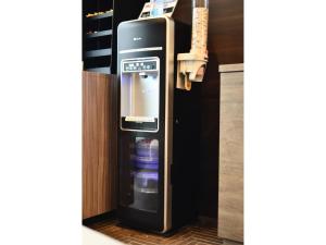 a refrigerator with a drink inside of it at Belken Hotel Kanda - Vacation STAY 80921v in Tokyo