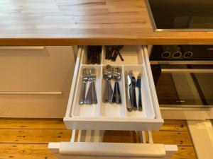 Kuchyň nebo kuchyňský kout v ubytování WH Immobilien Design City Appartement Rainshower + 10 fotografií
