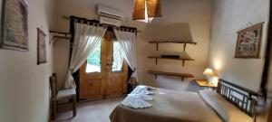 Ένα ή περισσότερα κρεβάτια σε δωμάτιο στο Casa María +23 φωτογραφίες