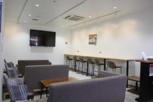 a conference room with a long table and chairs at The Lodge Moiwa 834 - Vacation STAY 36156v in Niseko