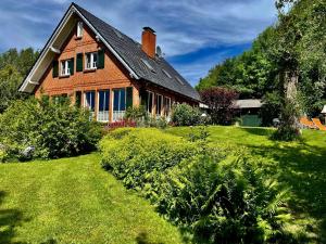 O grădină în afara Ein-Steinwurf-zum-Ostseestrand-Ferienwohnung-Martha-mit-Terrasse
