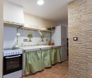 Kuchyňa alebo kuchynka v ubytovaní CASA RURAL BIENVENIDA