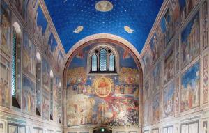 a large room with paintings on the ceilings of a church at Stunning Apartment In Abano Terme in Abano Terme +23 photos