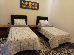 Postel nebo postele na pokoji v ubytování Villa HOMEY Lombok