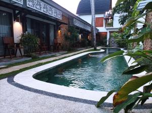 Bazén v ubytování Villa HOMEY Lombok nebo v jeho okolí
