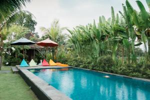 Bazén v ubytování Nauna Villa Ubud nebo v jeho okolí