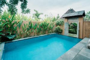 Bazén v ubytování Nauna Villa Ubud nebo v jeho okolí