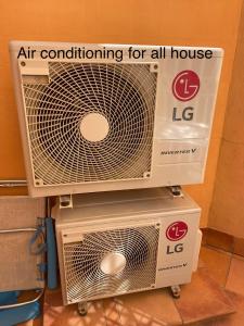 an air conditioner sitting on top of two boxes at Marbella Deluxe Rooms in Royal Cabopino Townhouse in Marbella
