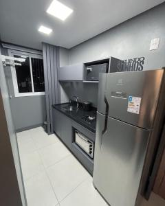 Köök või kööginurk majutusasutuses Apartamento Luxo com adega e vista espetacular!
