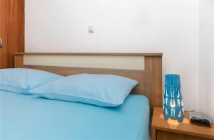 Ein Bett oder Betten in einem Zimmer der Unterkunft Apartment Milena