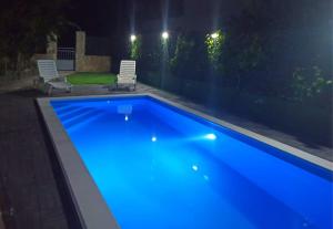 Der Swimmingpool an oder in der Nähe von Apartment Milena