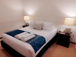 Cama ou camas em um quarto em Katari at Plaza de Armas Cusco