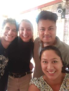 a group of three people posing for a picture at Swagat homestay in Kathmandu