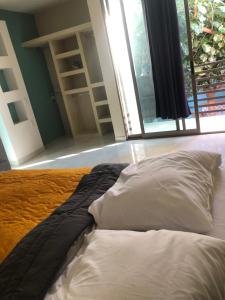 Katil atau katil-katil dalam bilik di Casa Brillante