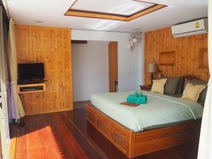 TV a/nebo společenská místnost v ubytování Koh Kood Beach Resort