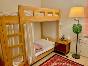 Giường trong phòng chung tại SOYA`S HOUSE +4 ảnh