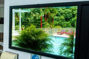 Bazén v ubytování Kandy Riverside Villa nebo v jeho okolí
