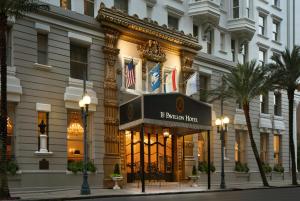 a large building with a large clock on the front of it at Le Pavillon New Orleans in New Orleans
