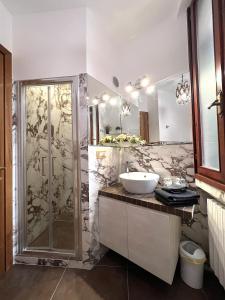 a bathroom with a sink and a shower at Cà Nova in Venice