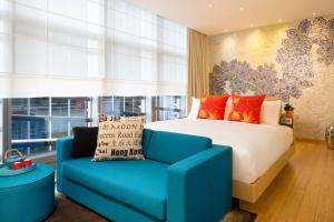 Tempat tidur dalam kamar di Hotel Indigo Hong Kong Island by IHG