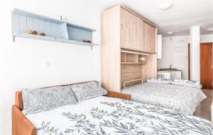 Posteľ alebo postele v izbe v ubytovaní Beautiful Apartment With Pool