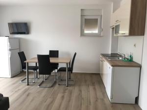 Kuchyň nebo kuchyňský kout v ubytování Holiday apartment in Punat with terrace, air conditioning, WiFi, washing machine 4534-3