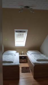 Postel nebo postele na pokoji v ubytování Ferienwohnung Schäfer Deichgraf