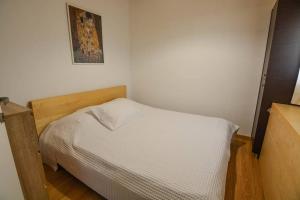 Postel nebo postele na pokoji v ubytování Dream Apartment Xylokastro