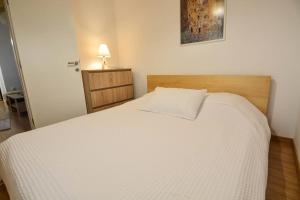 Postel nebo postele na pokoji v ubytování Dream Apartment Xylokastro
