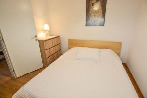 Postel nebo postele na pokoji v ubytování Dream Apartment Xylokastro