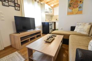 TV a/nebo společenská místnost v ubytování Dream Apartment Xylokastro