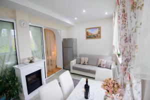 Et opholdsområde på Apartament Eliza + 42 billeder