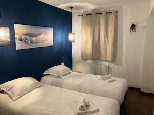 Postel nebo postele na pokoji v ubytování Les lofts M + 37 fotografií
