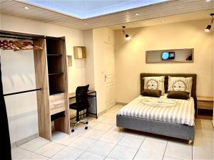 Posteľ alebo postele v izbe v ubytovaní LOFT SAINT JEAN