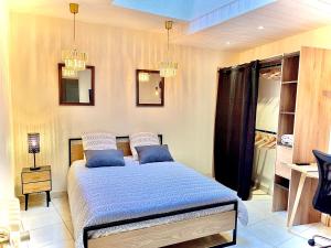 Posteľ alebo postele v izbe v ubytovaní LOFT SAINT JEAN