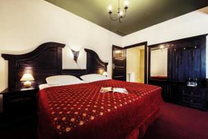 Katil atau katil-katil dalam bilik di Hotel Kasztel