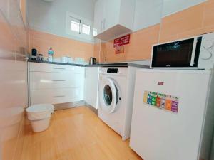 A kitchen or kitchenette at Agata Views